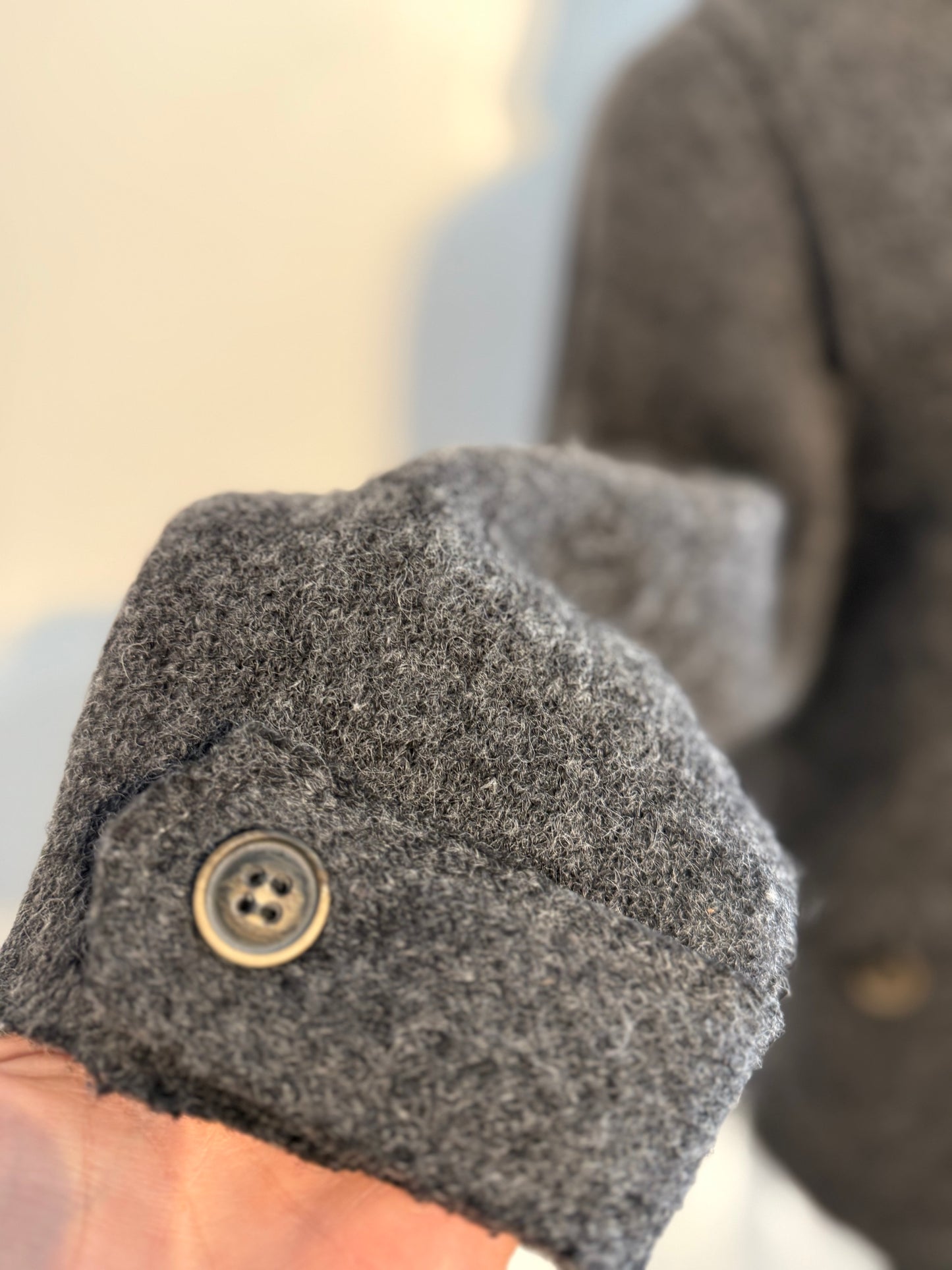 Giacca in lana grigia con cappuccio